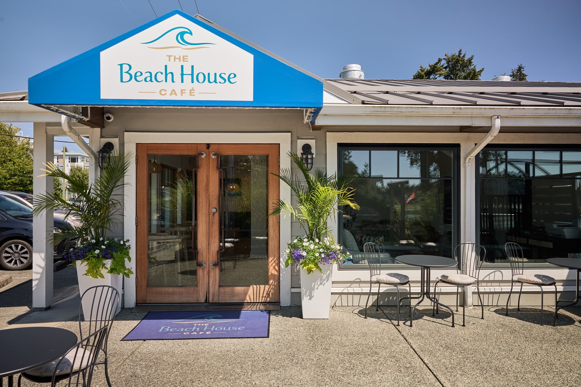 The Beach House Café front entrance with outdoor patio seating
