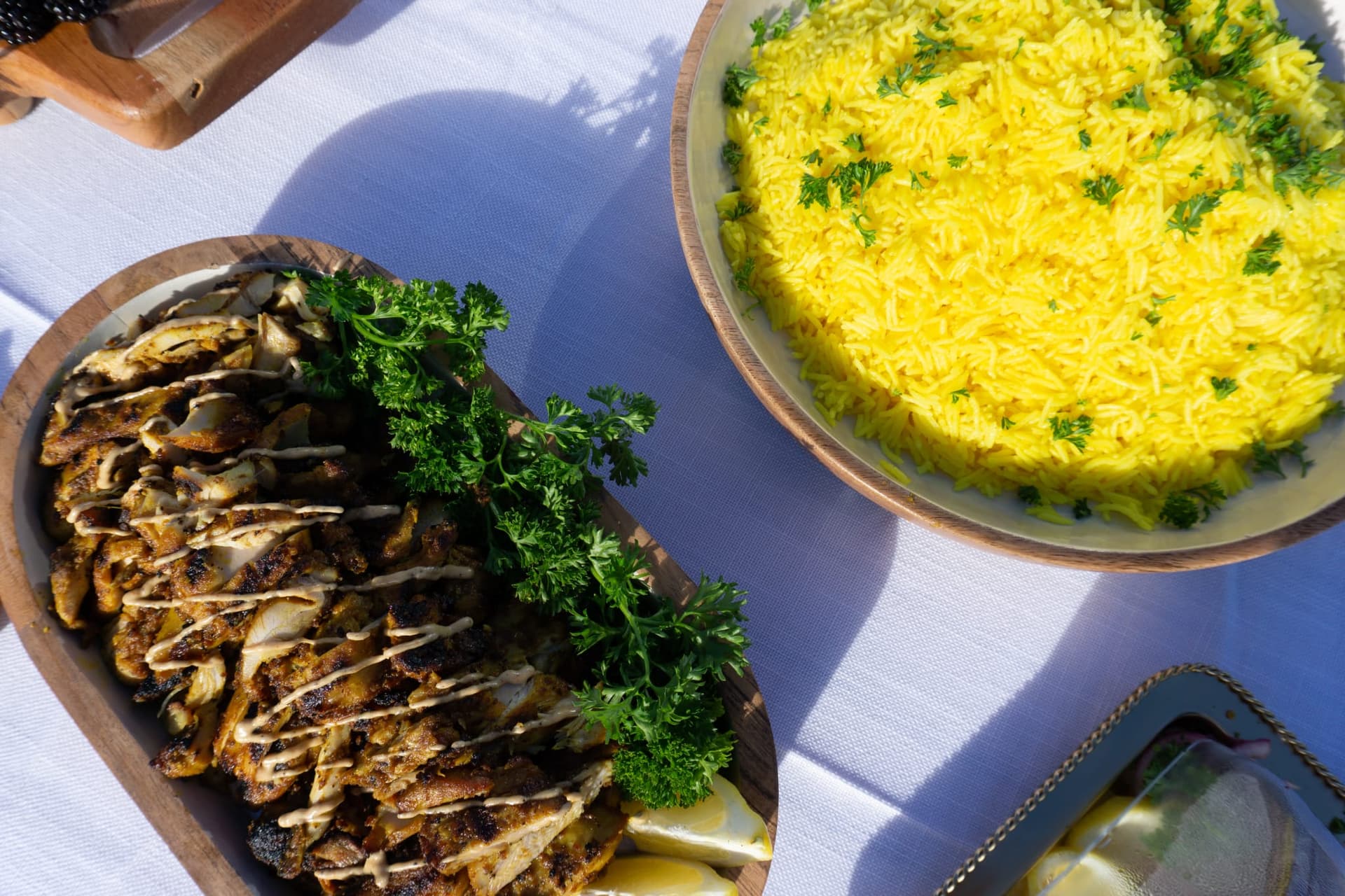 Grilled chicken and saffron rice buffet dishes